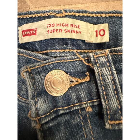 Levi’s Girls 710 Super Skinny Distressed Jeans Size 10 Blue Raw Hem - Picture 2 of 4